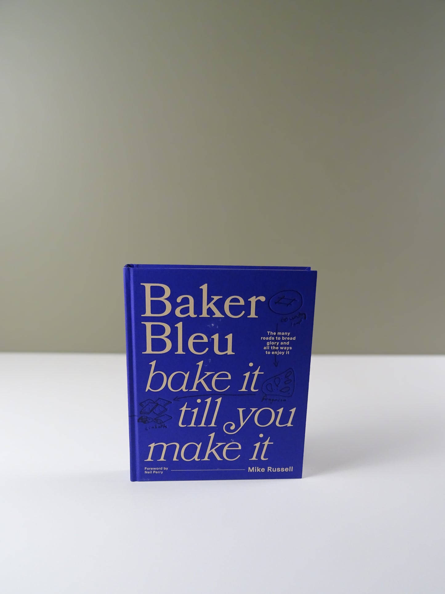 Baker Bleu: Bake It Till You Make It by Mike Russell