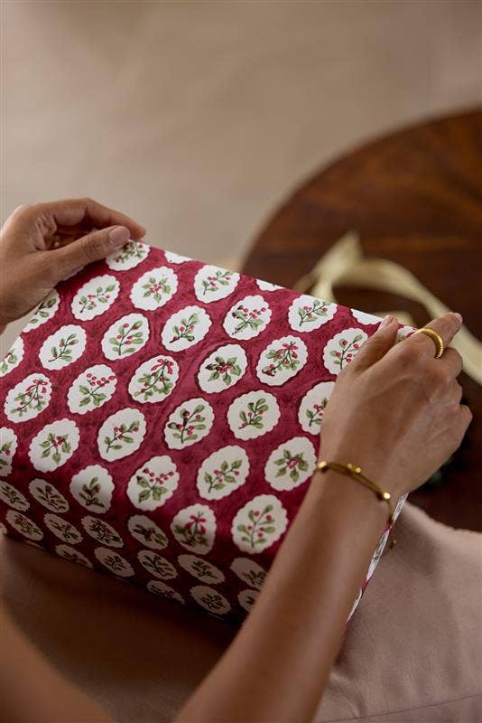 Block printed wrapping paper in Scallop Tiles Christmas Pudding