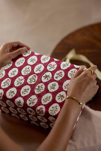 Block printed wrapping paper in Scallop Tiles Christmas Pudding