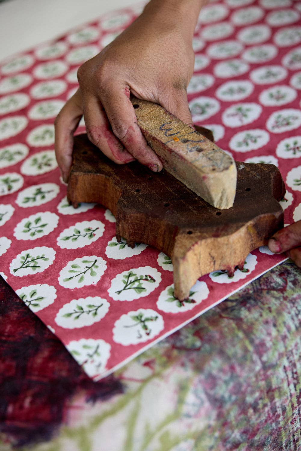 Block printed wrapping paper in Scallop Tiles Christmas Pudding