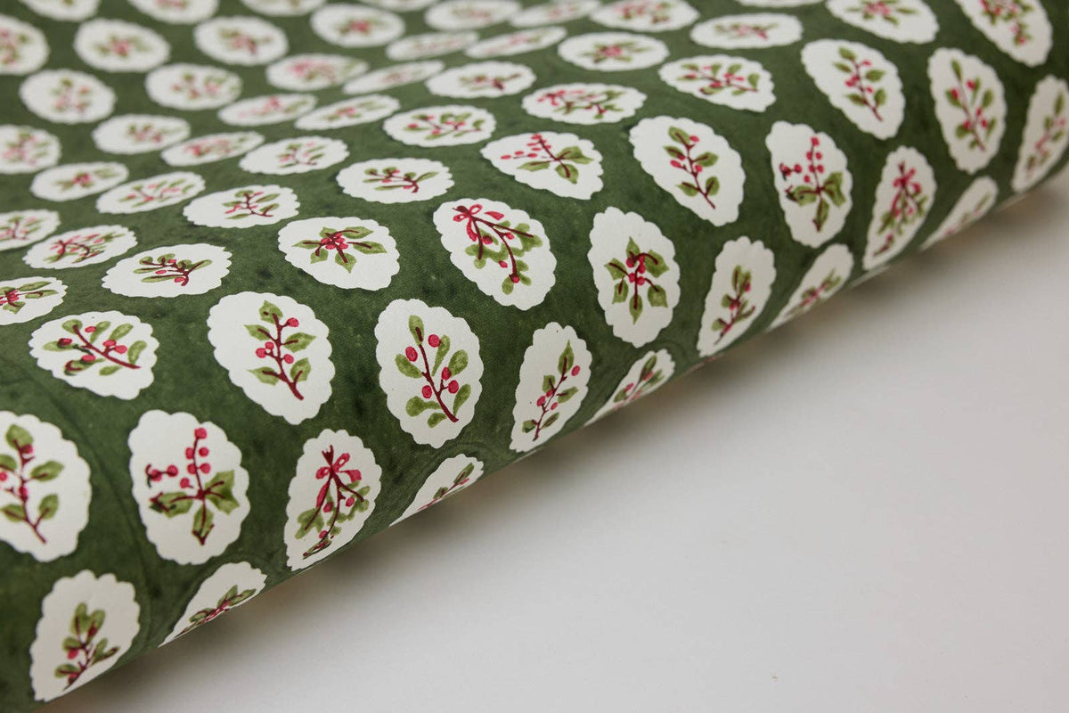 Block printed wrapping paper in Scallop Tiles Holly Green