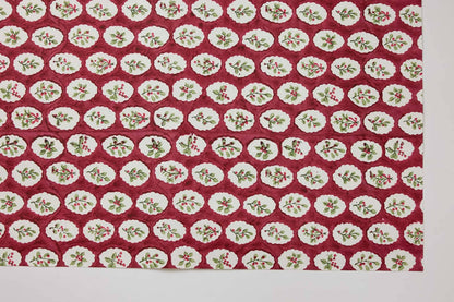 Block printed wrapping paper in Scallop Tiles Christmas Pudding