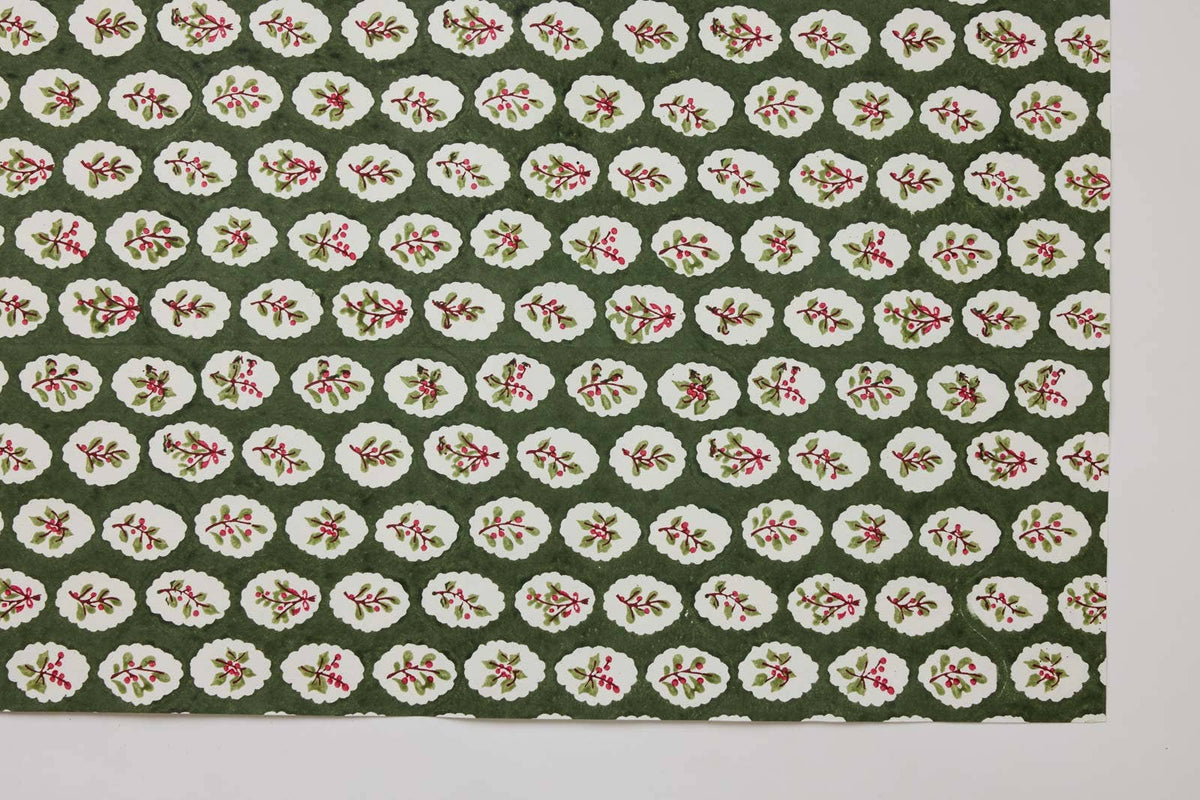 Block printed wrapping paper in Scallop Tiles Holly Green