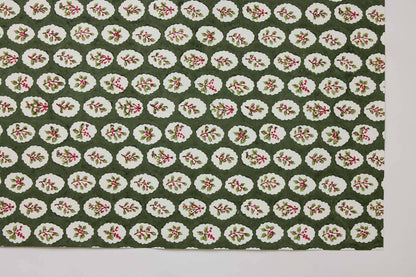 Block printed wrapping paper in Scallop Tiles Holly Green