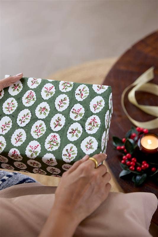 Block printed wrapping paper in Scallop Tiles Holly Green