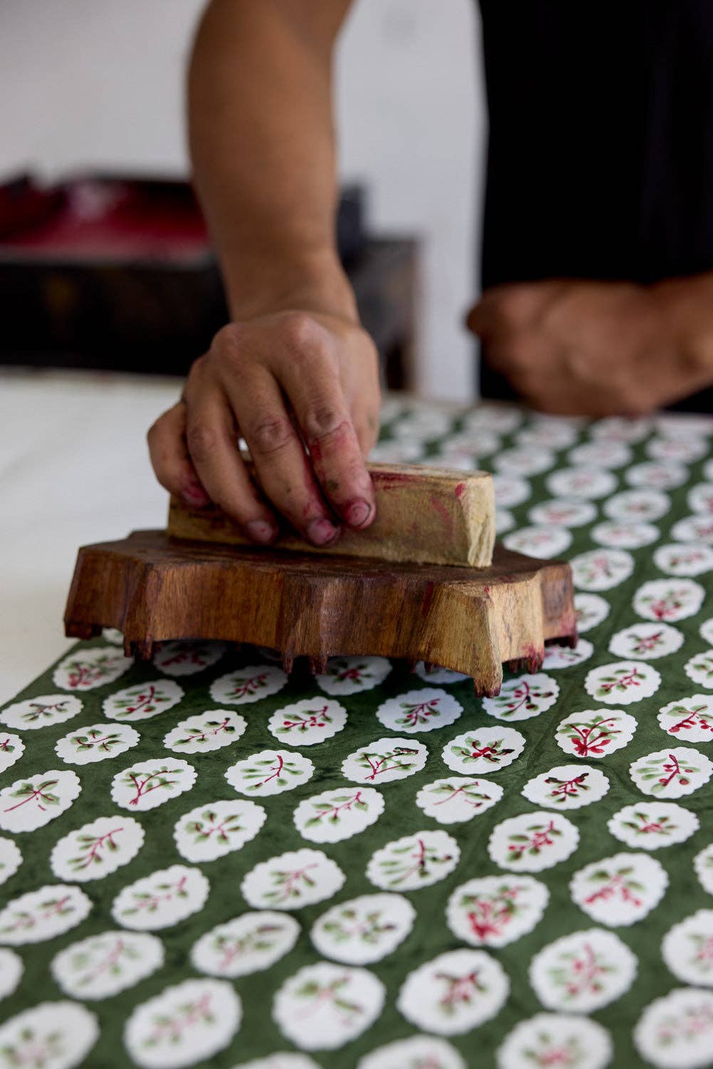 Block printed wrapping paper in Scallop Tiles Holly Green