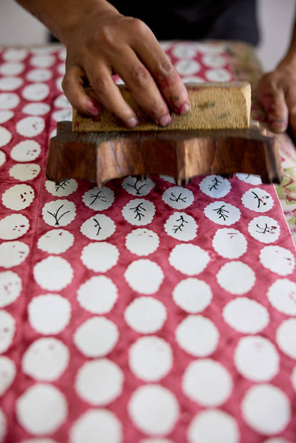 Block printed wrapping paper in Scallop Tiles Christmas Pudding
