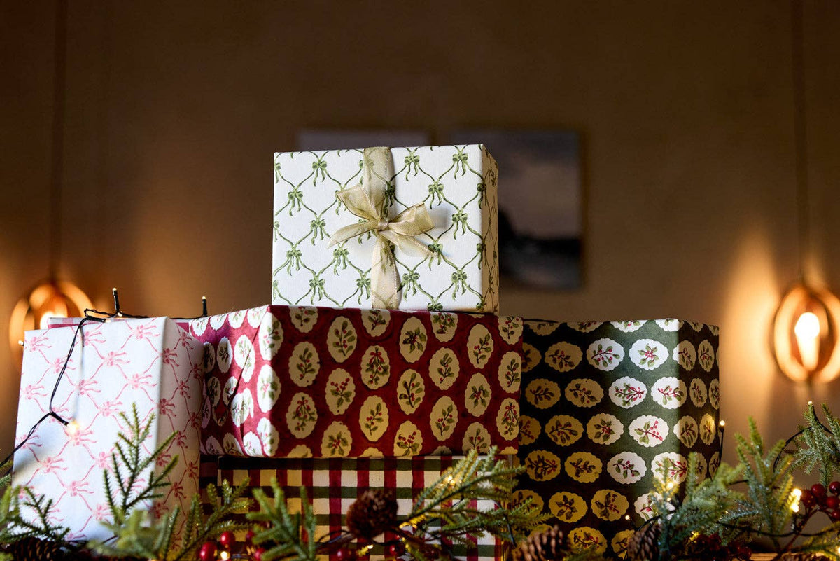 Block printed wrapping paper in Scallop Tiles Holly Green