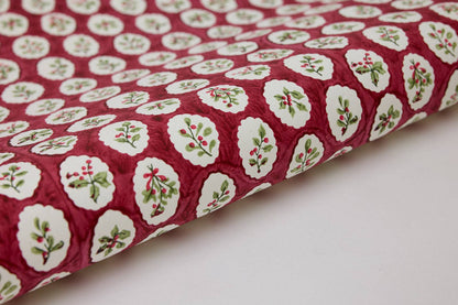 Block printed wrapping paper in Scallop Tiles Christmas Pudding