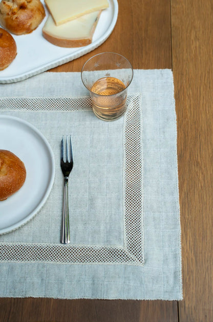 Portuguese melange placemats with a net lace frame by Bicla