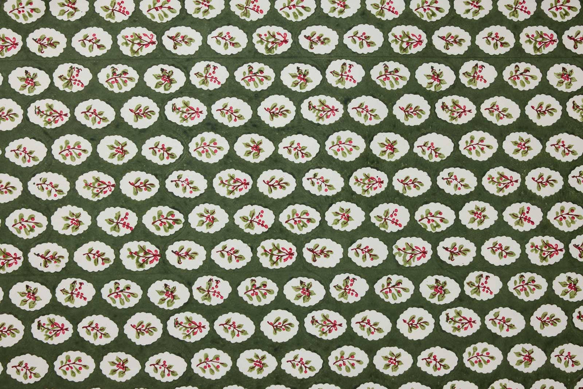Block printed wrapping paper in Scallop Tiles Holly Green