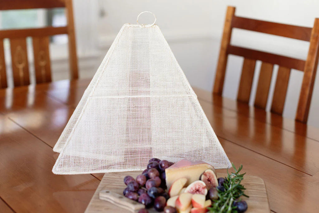 Small collapsible woven food tent cover in cream, detail of weave
