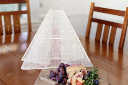 Small collapsible woven food tent cover in cream, detail of weave