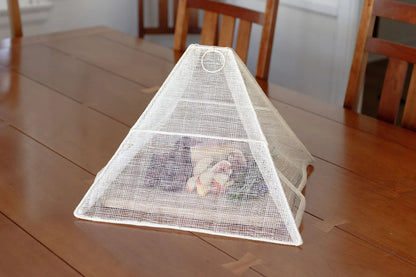 Small collapsible woven food tent cover in cream, side view